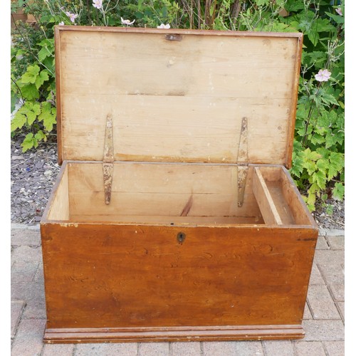 A stained pine Victorian blanket box, interior fitted with candle tray