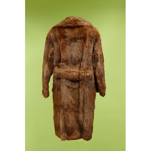 42 - An auburn 3/4 length fur coat, belted, size S/M, together with four fur stoles (5)