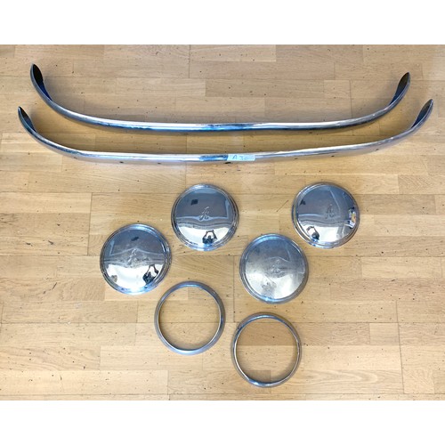 201 - A selection of Austin A30 chromed trim, to include bumpers, hubcaps and headlight surrounds.