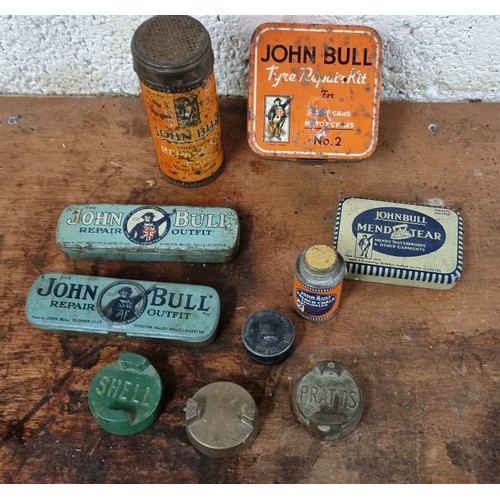 83 - A collection of John Bull tins and three 2 gallon can brass caps.