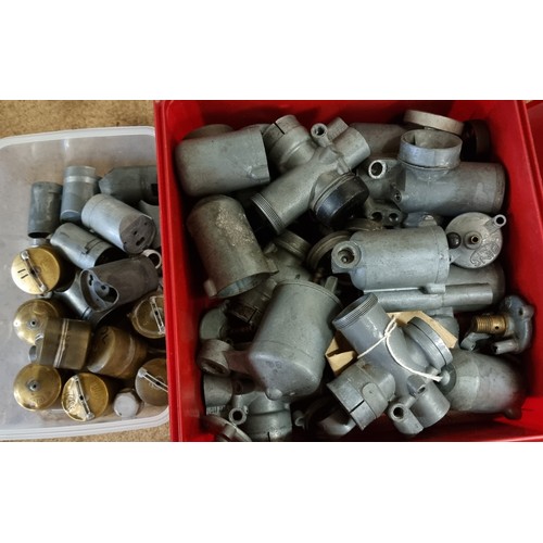 146 - A collection of Bing carburettor parts and bodies, suitable for NSU.