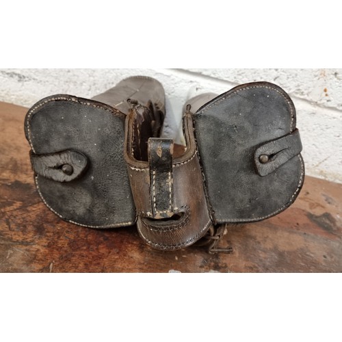 162 - A vintage leather saddle bag.
