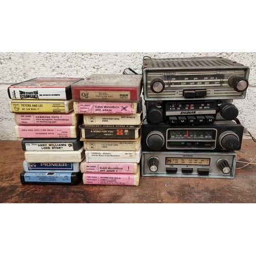 208 - Four car radios and various 8 track cassettes.