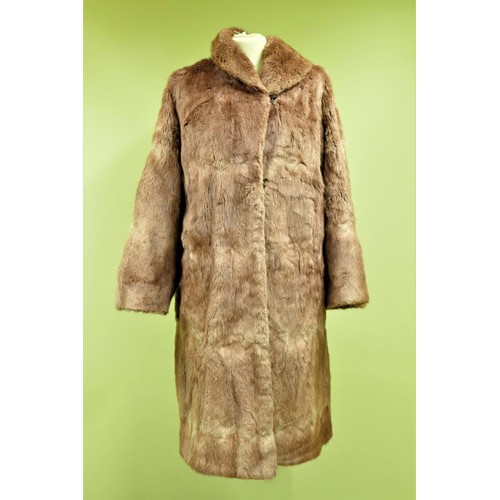 43 - Vintage furs, 3/4 length coat, two short jackets together with a 3/4 length labelled Marcus. (4)