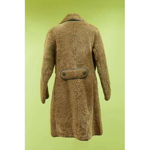 51 - Waddington's of Hull, lined sheepskin coat with leather trim and back belt with buttons, size 12