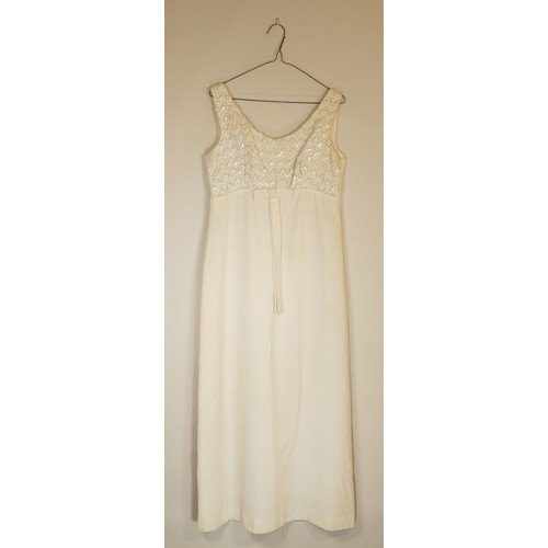 77 - Sequinned bodice long white dress with bow front, size 31inch chest.