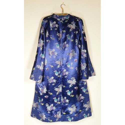 108 - A used satin brocade oriental dress coat, blue outer, cream inner reversible, 42inch chest.