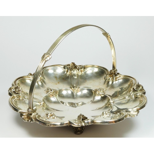 26 - A Victorian silver swing handle basket, by Robinson, Edkins & Aston, Birmingham 1838, the lobed desi... 
