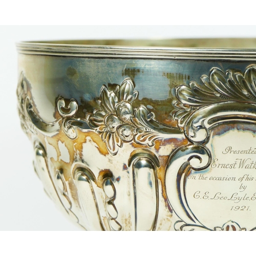 32 - A Victorian silver punch bowl, Sheffield 1900, with lobed, embossed and chased decoration, later mar... 