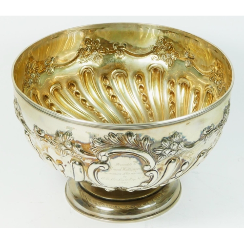 32 - A Victorian silver punch bowl, Sheffield 1900, with lobed, embossed and chased decoration, later mar... 