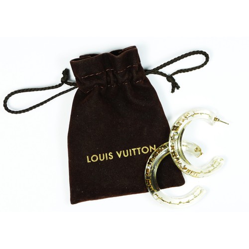 45 - Louis Vuitton, a pair of resin and encased metal ear rings, c.2000's, engraved LK 0131, diameter 50m... 