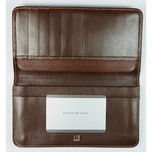 42 - Dunhill, a brown leather wallet, product code WU1110D, Dunhill guarantee card dated 7.6.01, 18 x 10c... 