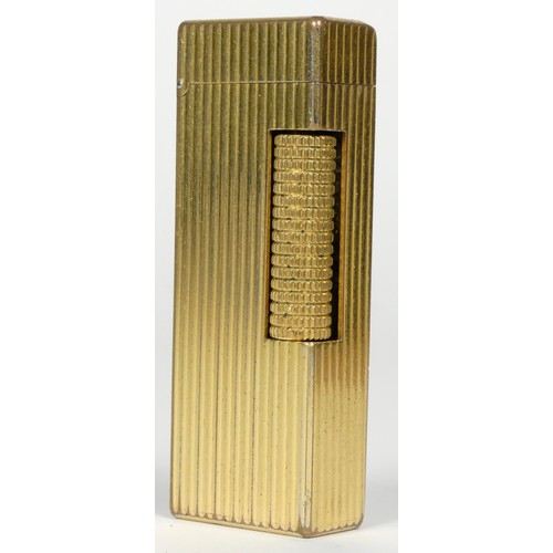 40 - Dunhill, a ribbed gold plated Rollagas lighter.