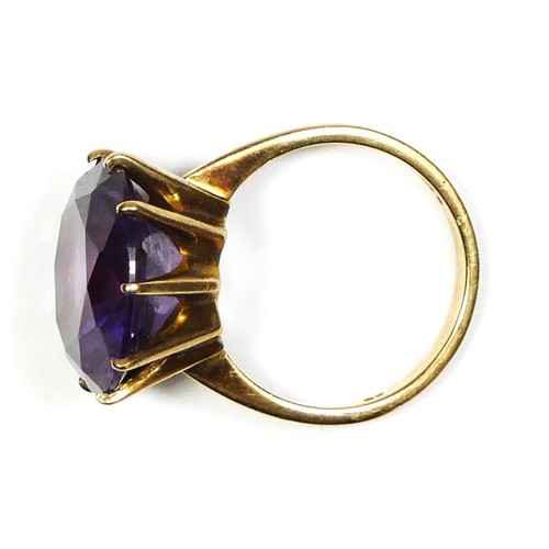 66 - A 9ct gold purple/blue colour change synthetic sapphire dress ring, diameter 15mm, M 1/2, 5.8gm