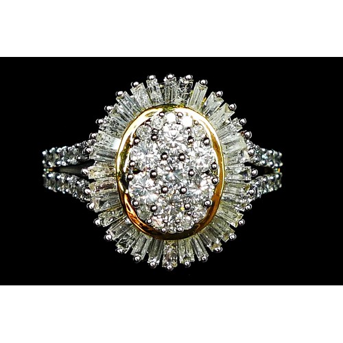 70 - A 9ct gold, brilliant and baguette cut diamond cluster ring, limited edition of 40 pieces, diamond w... 