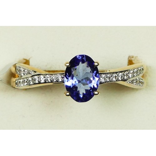 72 - A 14ct gold single stone tanzanite ring, with brilliant cut diamond set shoulders, U, 3gm, Gemporia ... 