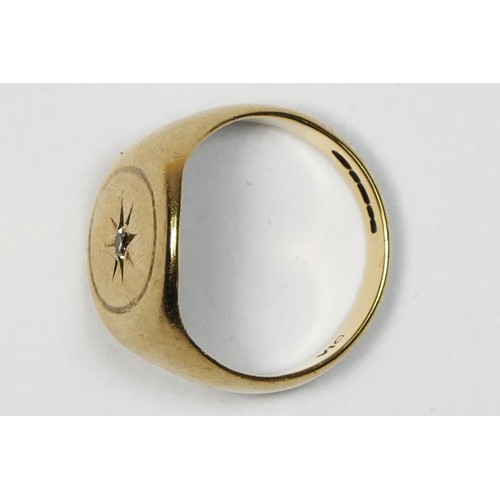 83 - A 9ct gold and diamond signet ring, star set with a brilliant cut stone, 7.1gm, O 1/2.