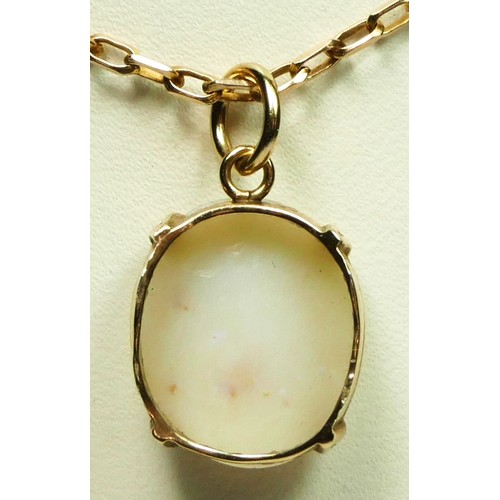 84 - A 9ct gold mounted opal pedant, 14 x 12mm, 6gm, the setting converted from a ring.