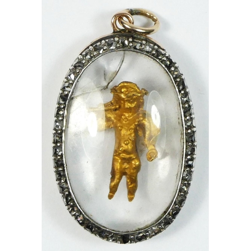 55 - A Georgian rose diamond silver set gold pendant, with encased gold cherub with trumpet, 31 x 22mm.