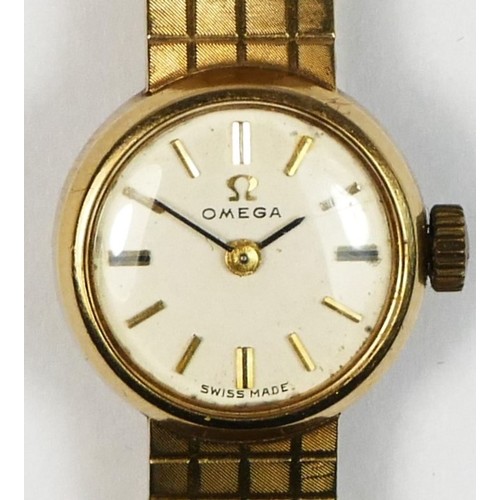 117 - WITHDRAWN - Omega, a 9ct gold manual wind ladies wristwatch, London 1965, silvered dial to an integr... 