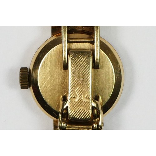 117 - WITHDRAWN - Omega, a 9ct gold manual wind ladies wristwatch, London 1965, silvered dial to an integr... 