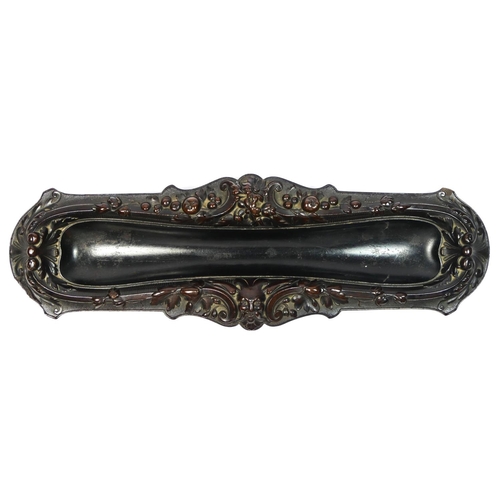 135 - A 19th century French carved lignum vitae pen tray, with mask and floral decoration, 31 x 10cm.