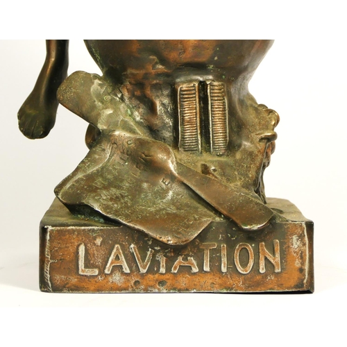 136 - L'Aviation, an early 20th century bronzed spelter trophy/statue, depicting a youth holding a flaming... 