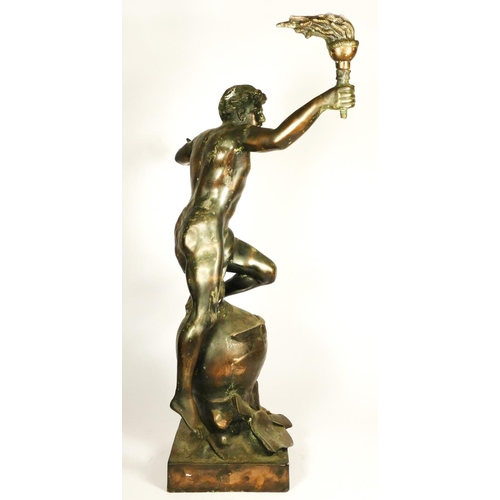 136 - L'Aviation, an early 20th century bronzed spelter trophy/statue, depicting a youth holding a flaming... 