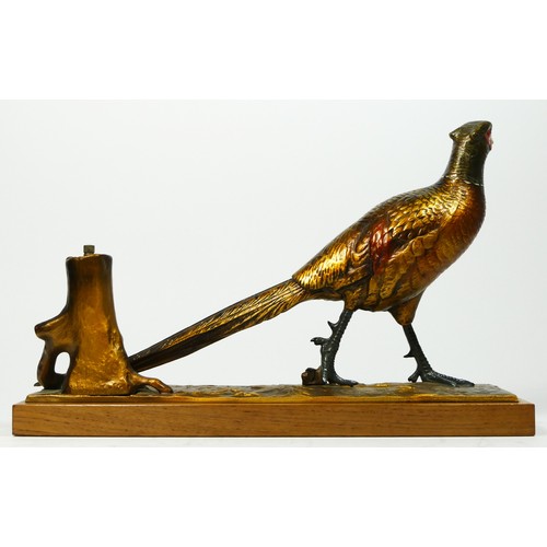 138 - An Austrian cold painted spelter 'striker' table lighter in the form of a cock pheasant by a tree st... 