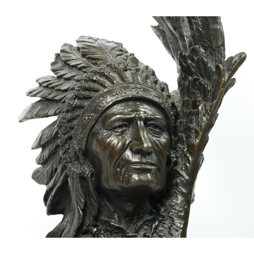 142 - Unsigned, a 20th century cast bronze of a Native American chief with eagle, 33cm.