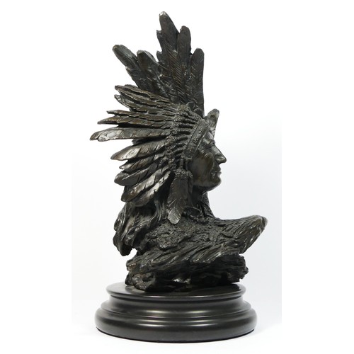 142 - Unsigned, a 20th century cast bronze of a Native American chief with eagle, 33cm.