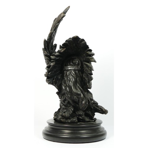 142 - Unsigned, a 20th century cast bronze of a Native American chief with eagle, 33cm.