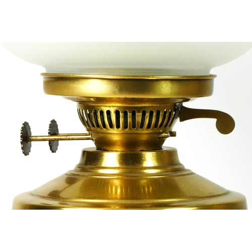 163 - A brass column oil lamp, with frosted etched glass shade with chimney, 54cm tall