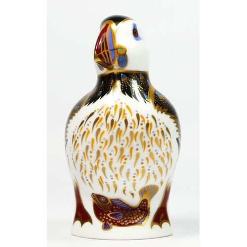 165 - A Royal Crown Derby paperweight modelled as a puffin, silver button, 11.5cm tall.