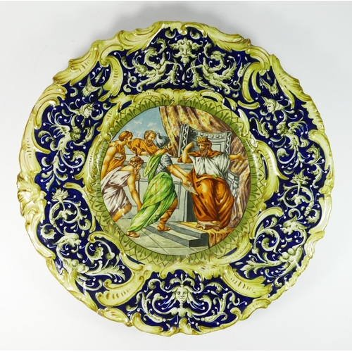 168 - A pair of Italian majolica chargers, crowned M, depicting mythological/biblical scenes, diameter 47c... 