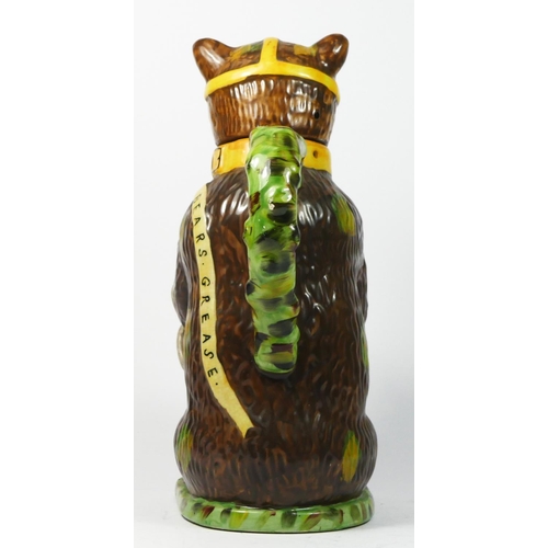 179 - A bear baiting advertising jar and cover, modelled as a large bear clutching a snarling dog between ... 