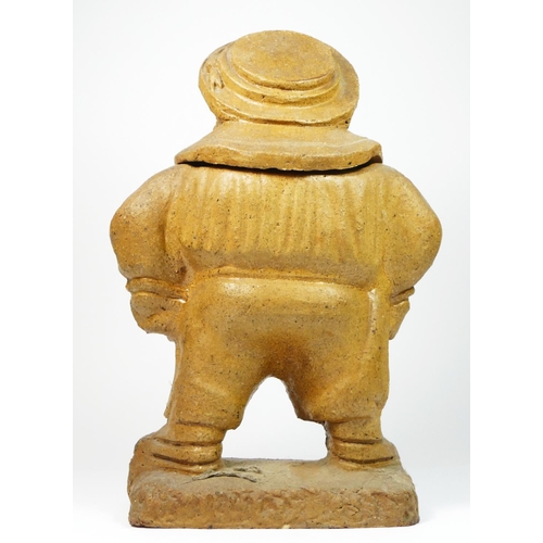 180 - A Dutch 19th century salt glazed pottery figural tobacco jar with lift off head, 32cm.