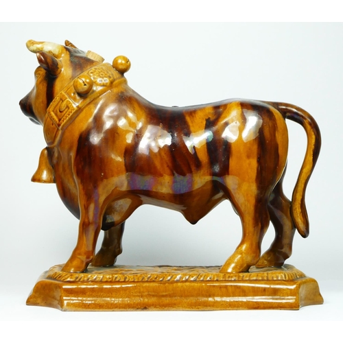 181 - A Mafra, Caldas, Portugal treacle glazed pottery novelty decanter, in the form of a bull, impressed ... 