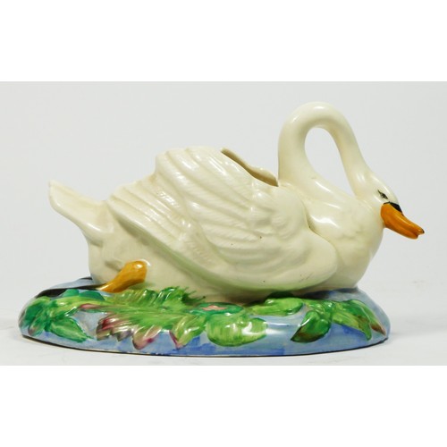 189 - A Clarice Cliff swan posy vase holder, circa 1940, modelled as an open backed swan on floral and wat... 