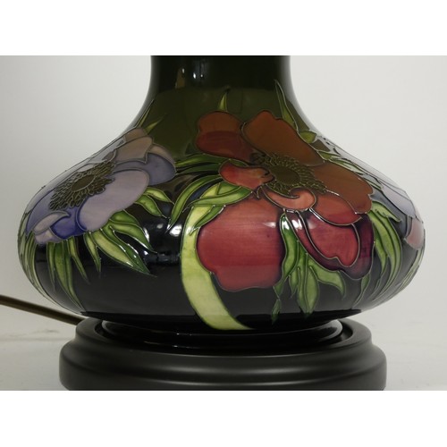 196 - Moorcroft, a contemporary tube lined Clematis pattern baluster lamp, 19cm.