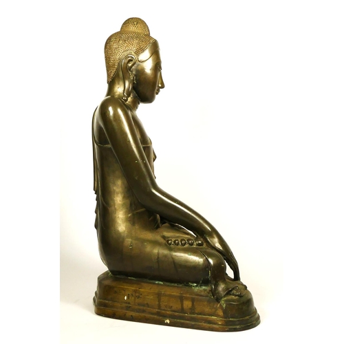 218 - A hollow cast Burmese bronze seated buddha, in the Mandalay style, probably late 19th century, 51cm.