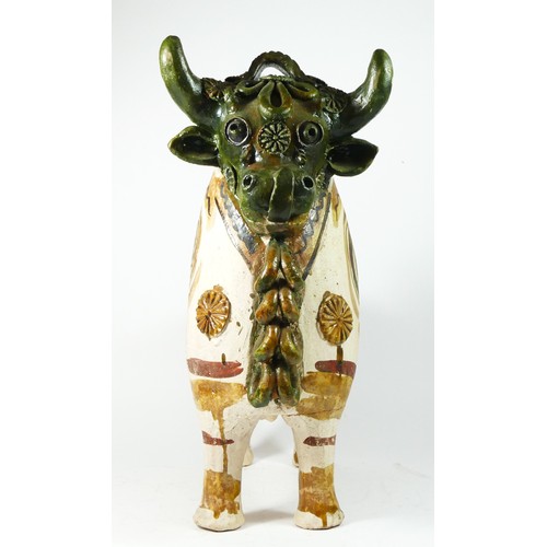 222 - A Peruvian folk pottery ceremonial figure of a bull, 47 x 37cm