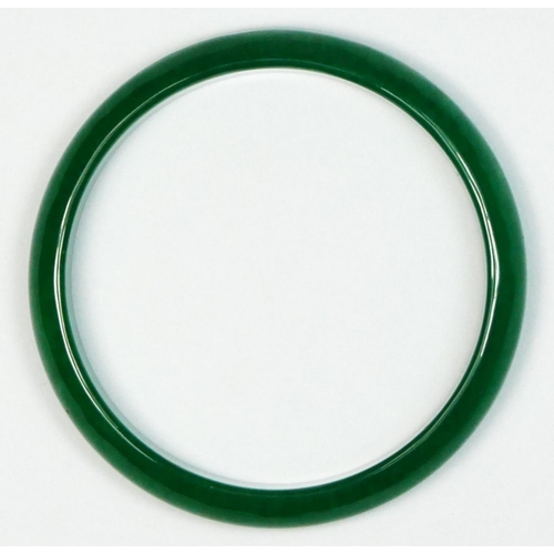 232 - A jadeite bangle, untested for colour, internal diameter 60mm.