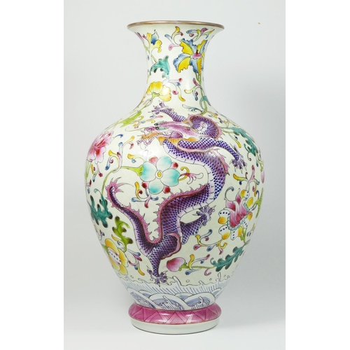 233 - A Chinese famile rouge baluster vase, with blue and pink dragon decoration, 35cm