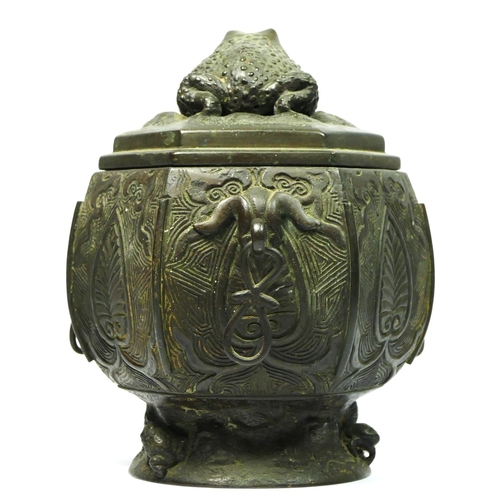 249 - A Chinese bronze octagonal baluster storage jar, with frog finial, 18cm.