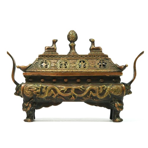 261 - A Chinese bronze censor with dragon motifs, 20 x 14 x 6cm.