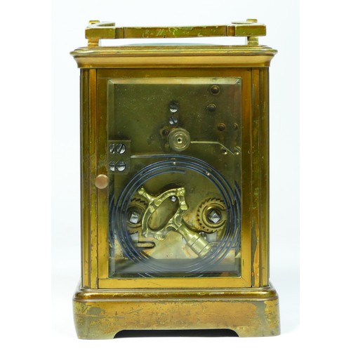 267 - A late 19th century brass striking carriage clock, the silvered chapter ring with Arabic numerals, t... 