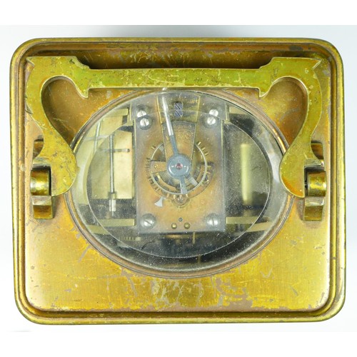 267 - A late 19th century brass striking carriage clock, the silvered chapter ring with Arabic numerals, t... 