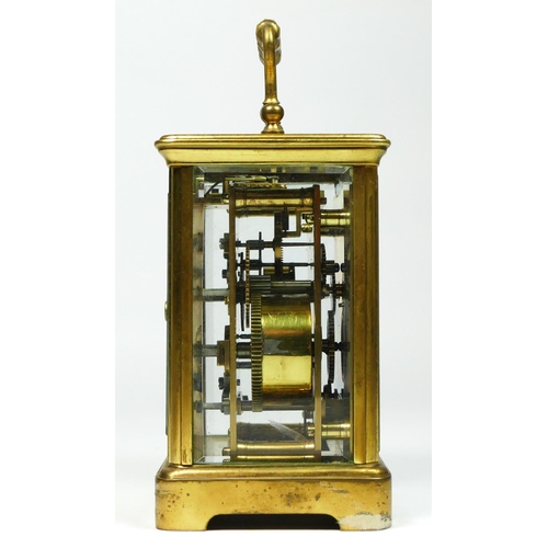 271 - A brass alarm carriage clock, the white enamel dial lacking minute and alarm hands, the movement str... 