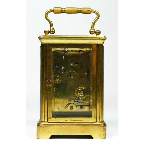 271 - A brass alarm carriage clock, the white enamel dial lacking minute and alarm hands, the movement str... 